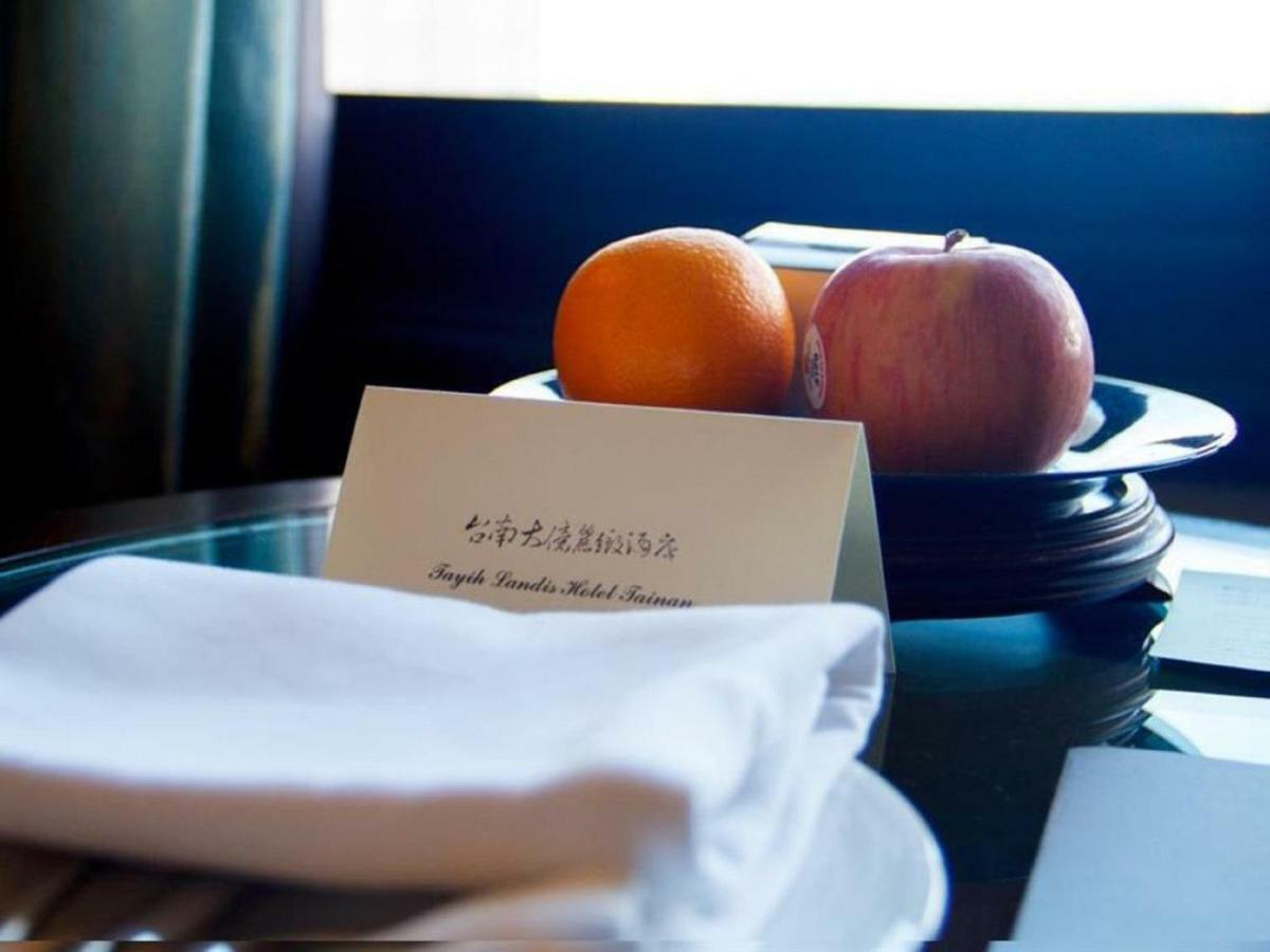 Tayih Landis Hotel Tainan Exterior photo A turndown service card